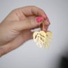 Handmade in Oregon Monstera Adansonii earrings at Northwest Nature Shop in Ashland Oregon