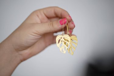 Handmade in Oregon Monstera Adansonii earrings at Northwest Nature Shop in Ashland Oregon