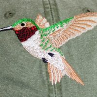 Ruby-Throated Hummingbird Cap at Northwest Nature Shop in Ashland Oregon